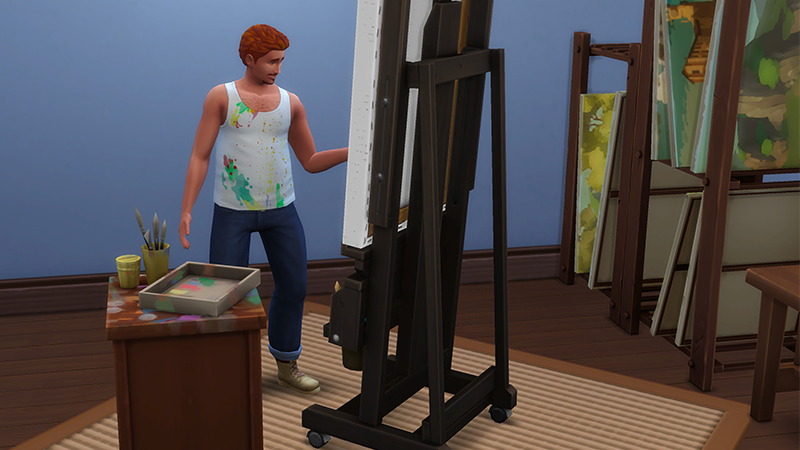A Sim wearing a paint-splattered top, stands in front of an easel painting, beside a table covered in painting supplies.
