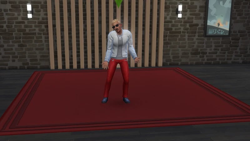A Sim wearing red trousers, a white jacket, and sunglasses stands in the middle of a room performing an acting scene.