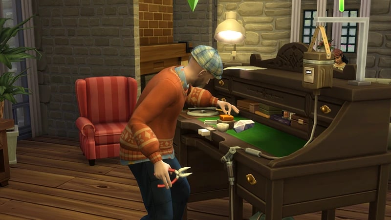 A Sim wearing an orange sweater and a patterned hat, holding pliers, crafts a piece of jewelry at the Gemology Table.