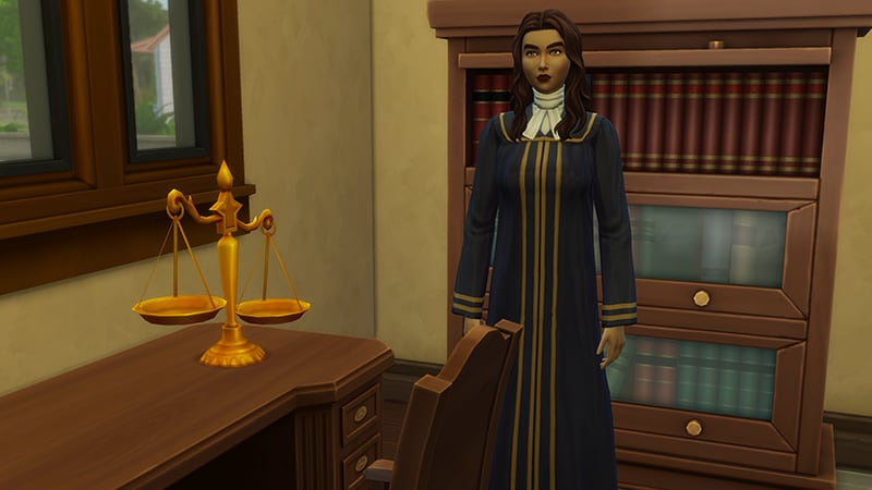 A Sim wearing the court robes of a lawyer stands next to a table that holds a set of gold balance scales.
