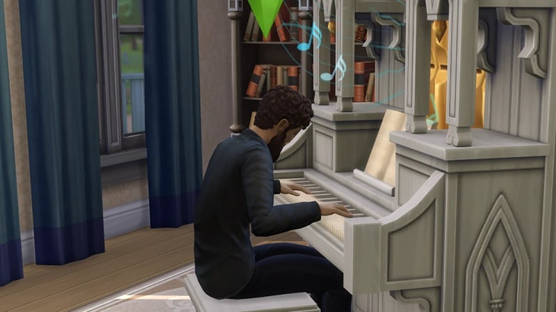 A Sim wearing all black with a beard plays music sitting at a white and gold Pipe Organ.