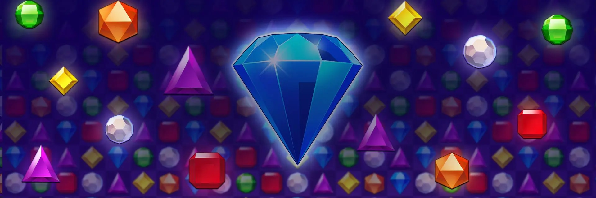 Una gran gema azul brillante rodeada de coloridas gemas que forma un tablero de juego de Bejeweled Blitz.